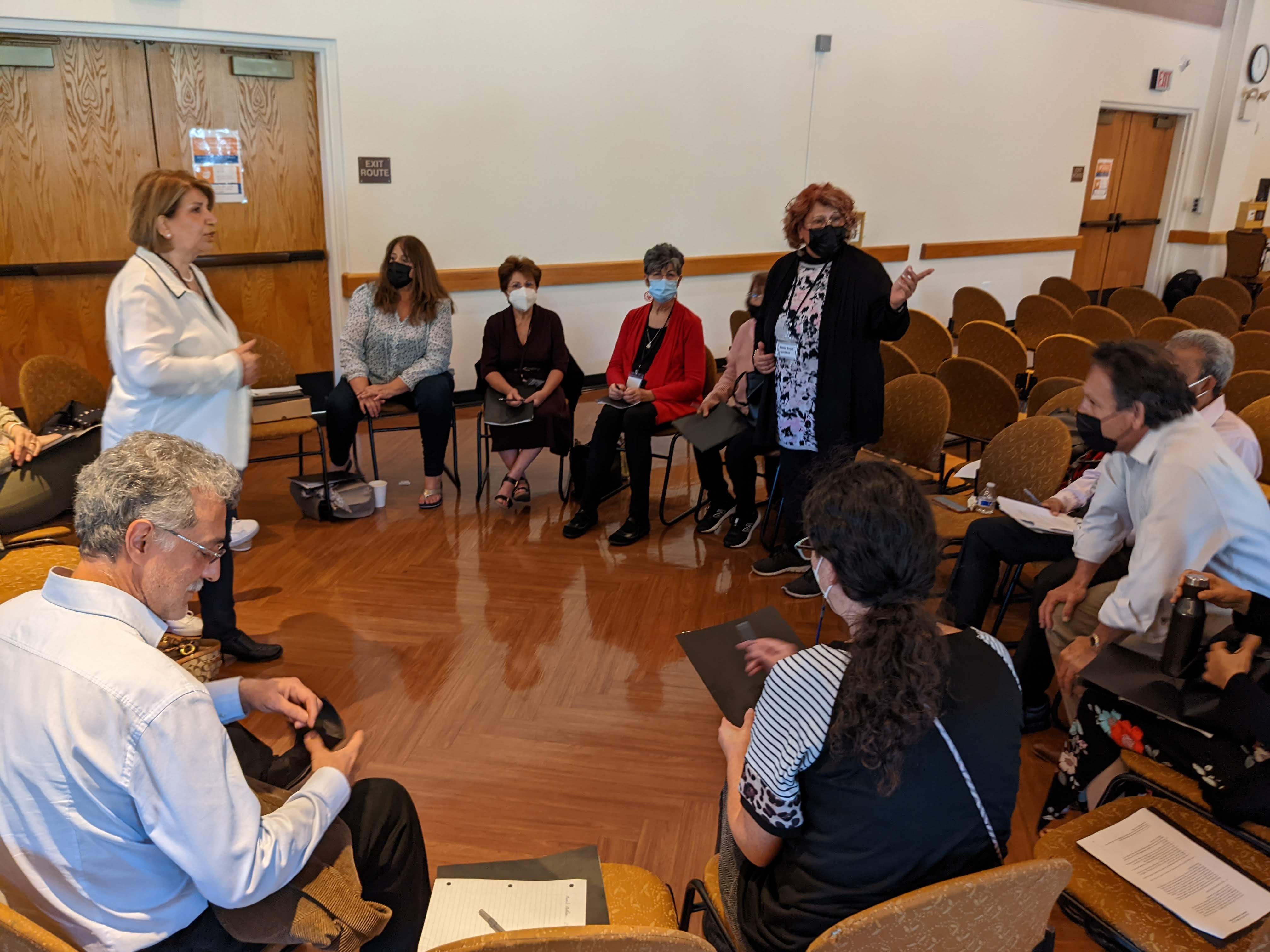 Community members discussing community building activities